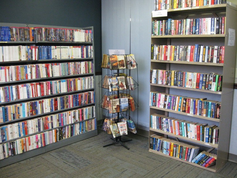 shelves lined with pocket-sized paperback books